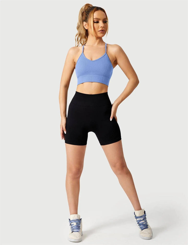 MunaWear  Bras  Luna – High Support Seamless Sports Bra with Crossed Back Straps and Removable Pads for Ultimate Comfort  Baby-Blue-XL