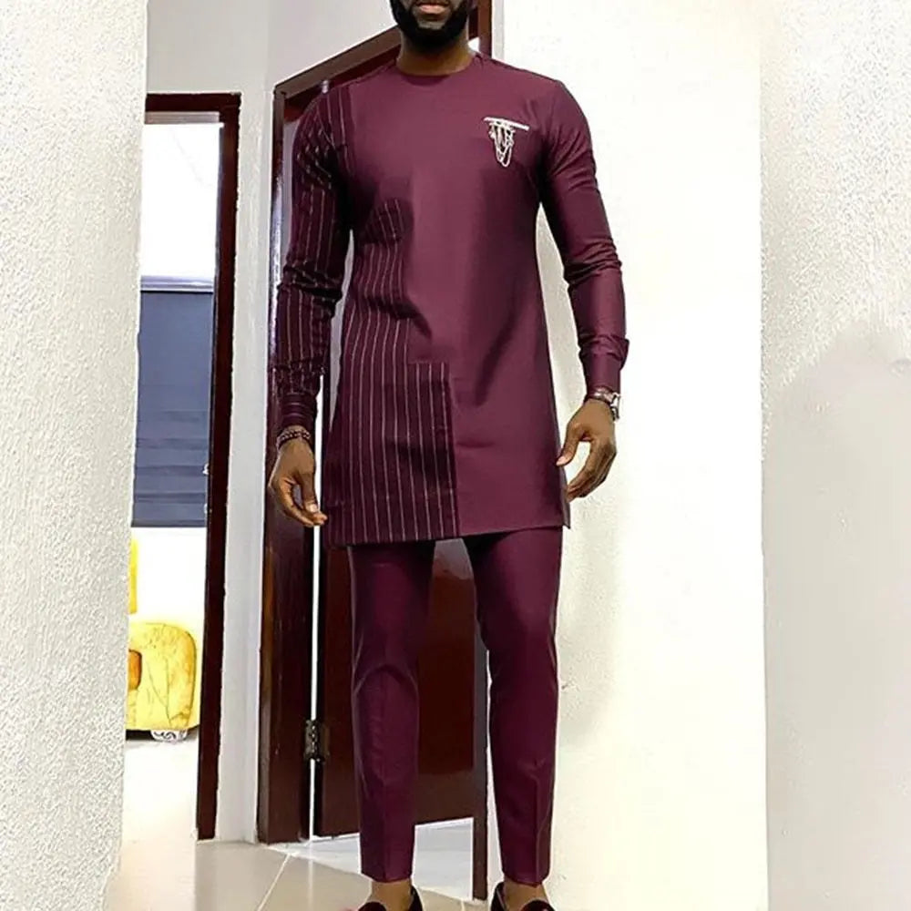 https://cdn.shopify.com/s/files/1/0879/0949/9227/files/Traditionele_Dashiki_Heren_Set_Luxe_Tweedelige_Outfit_T-E3.jpg