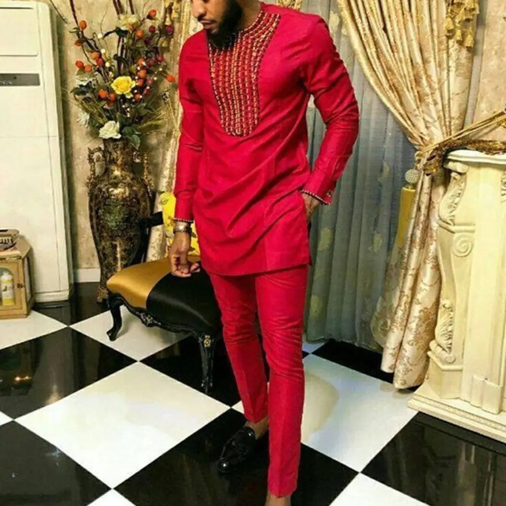 https://cdn.shopify.com/s/files/1/0879/0949/9227/files/Traditionele_Dashiki_Heren_Set_Luxe_Tweedelige_Outfit_T-E4.jpg