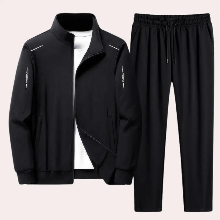 https://cdn.shopify.com/s/files/1/0879/0949/9227/files/Zwart_Randy_Trainingspak_voor_Heren_Stijl_en_Comfort_in_n_T-E.png