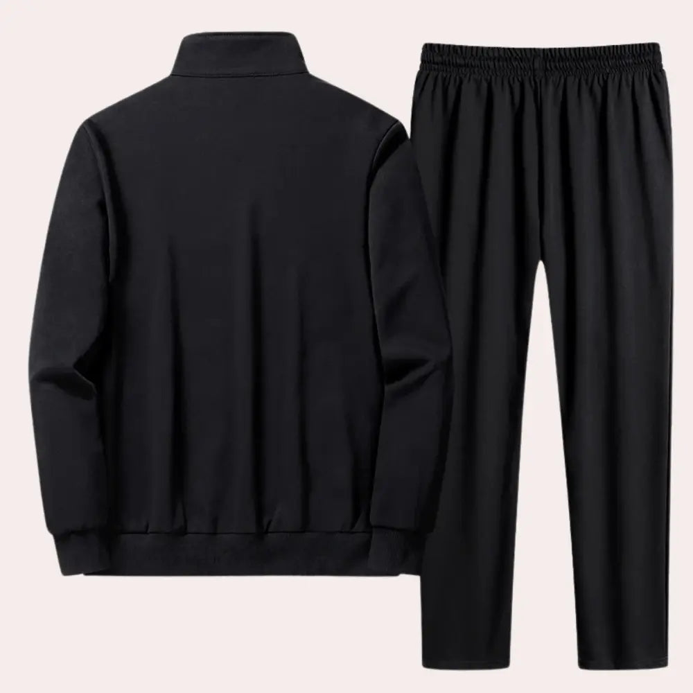 https://cdn.shopify.com/s/files/1/0879/0949/9227/files/Zwart_Randy_Trainingspak_voor_Heren_Stijl_en_Comfort_in_n_T-E_2.png