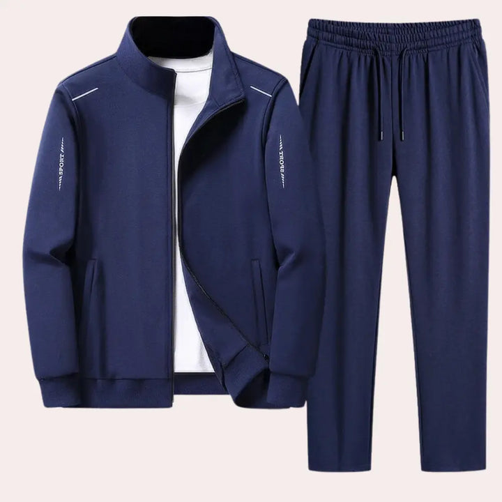 https://cdn.shopify.com/s/files/1/0879/0949/9227/files/Blauw_Randy_Trainingspak_voor_Heren_Stijl_en_Comfort_in_n_T-E.png