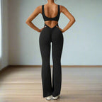 Adeline – Flared Black Jumpsuit for Women with Deep V-Back for Yoga and Fitness