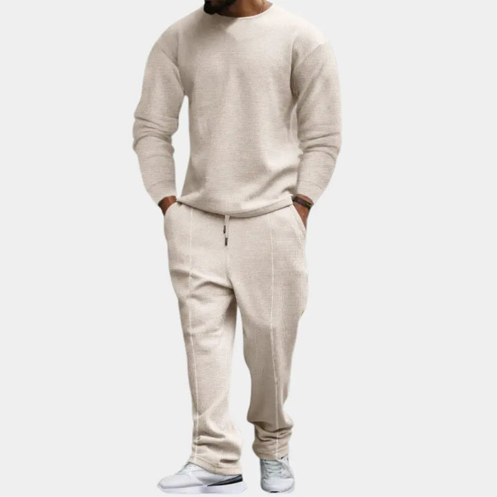 https://cdn.shopify.com/s/files/1/0879/0949/9227/files/Khaki_Ellroy_Luxe_Heren_Tweedelige_Set_Tijdloos_comfort_voor_de_moderne_man_T-E.png