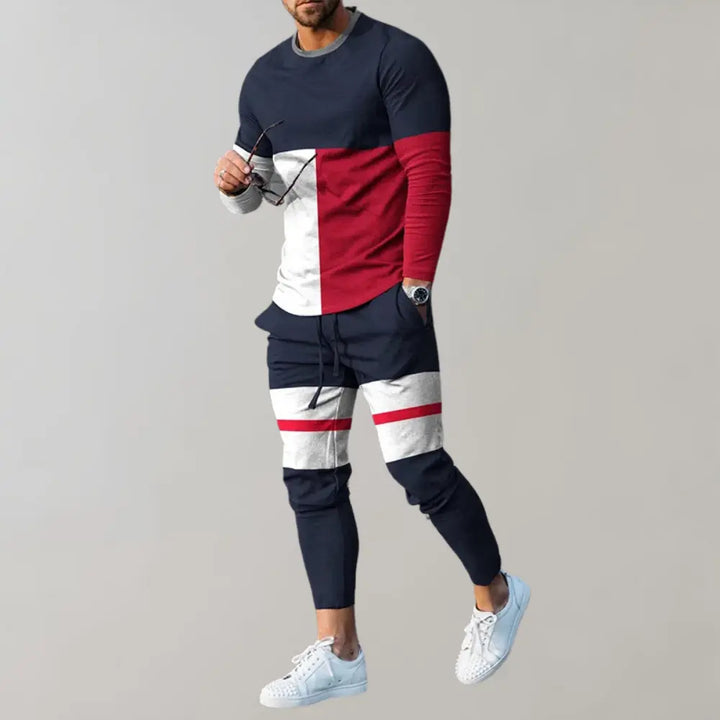https://cdn.shopify.com/s/files/1/0879/0949/9227/files/Marineblaauw_en_rood_Axel_Stijlvolle_Trainingspakken_voor_Mannen_T-E.png