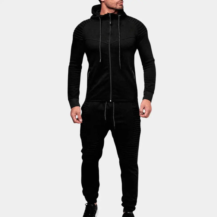 https://cdn.shopify.com/s/files/1/0879/0949/9227/files/ZWart_LUCAS_-_Stijlvol_Trainingspak_voor_Heren_T-E.png