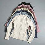 MunaWear  Yoga Apparel  Mia – High-Elastic Loose-Fit Long Sleeve Yoga Top for Women with Stand-Up Collar 